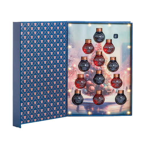 Best Holiday Wishes variety gift pack with mini whisky bottles shaped like Christmas balls.